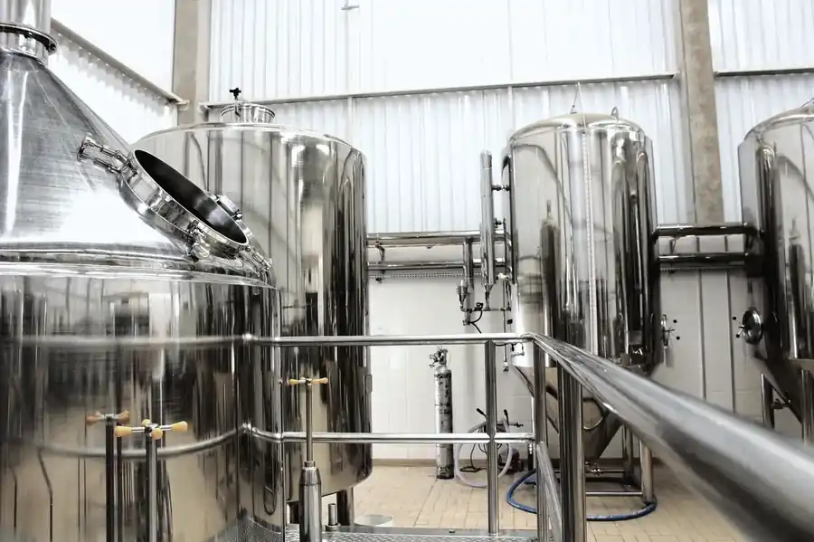 Stainless steel process tanks in a food-grade facility
