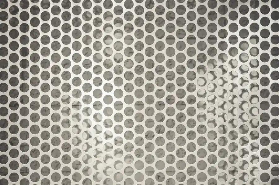 Perforated stainless steel sheet with uniform round-hole pattern