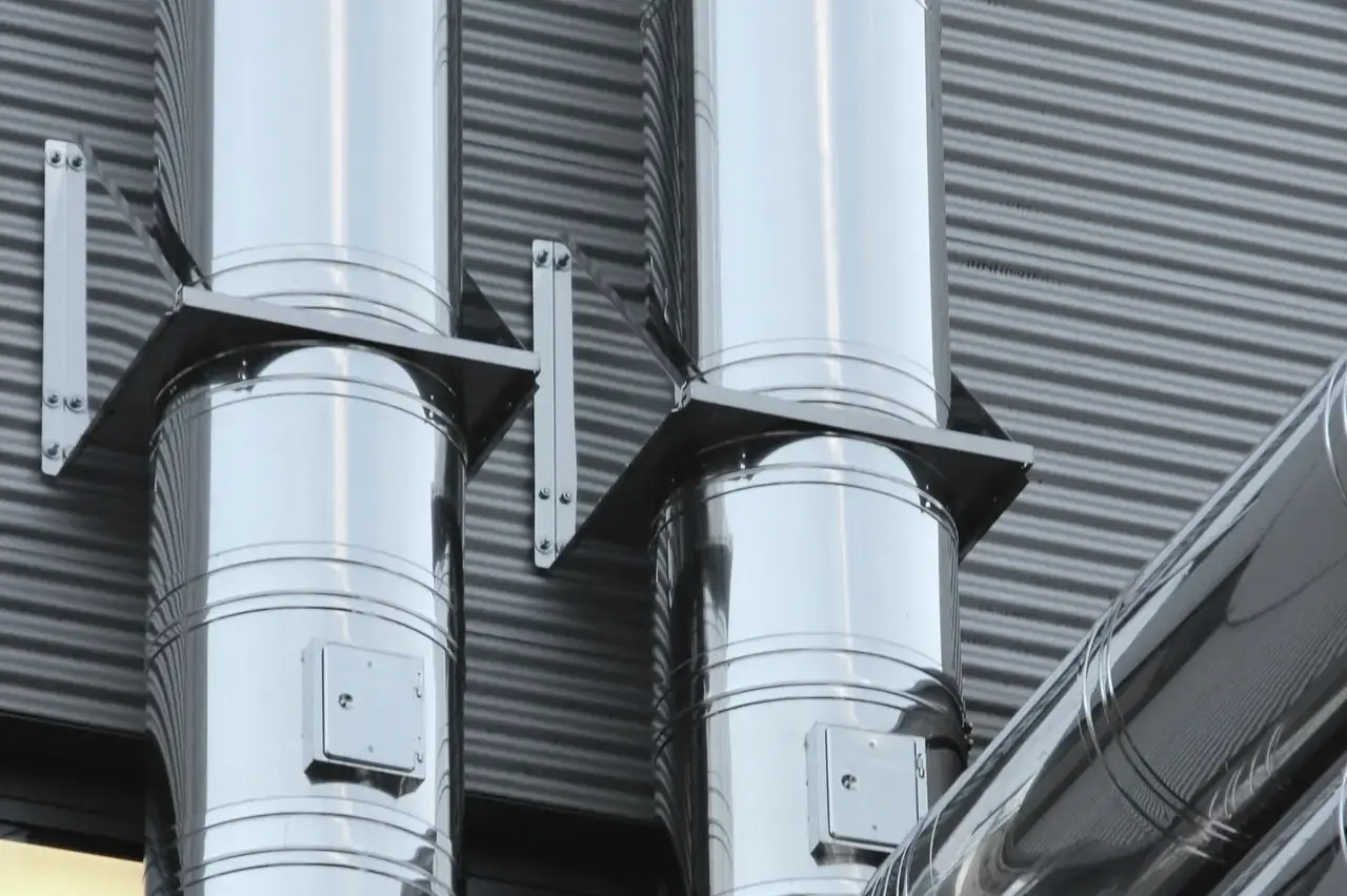 Shiny stainless steel pipework built from 316-grade material