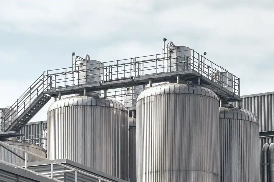 Stainless steel storage tanks at an industrial facility